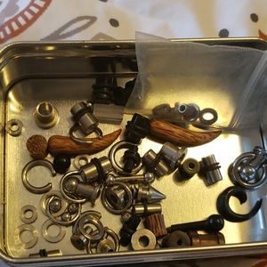 Tin full of Gauged Ear Plugs